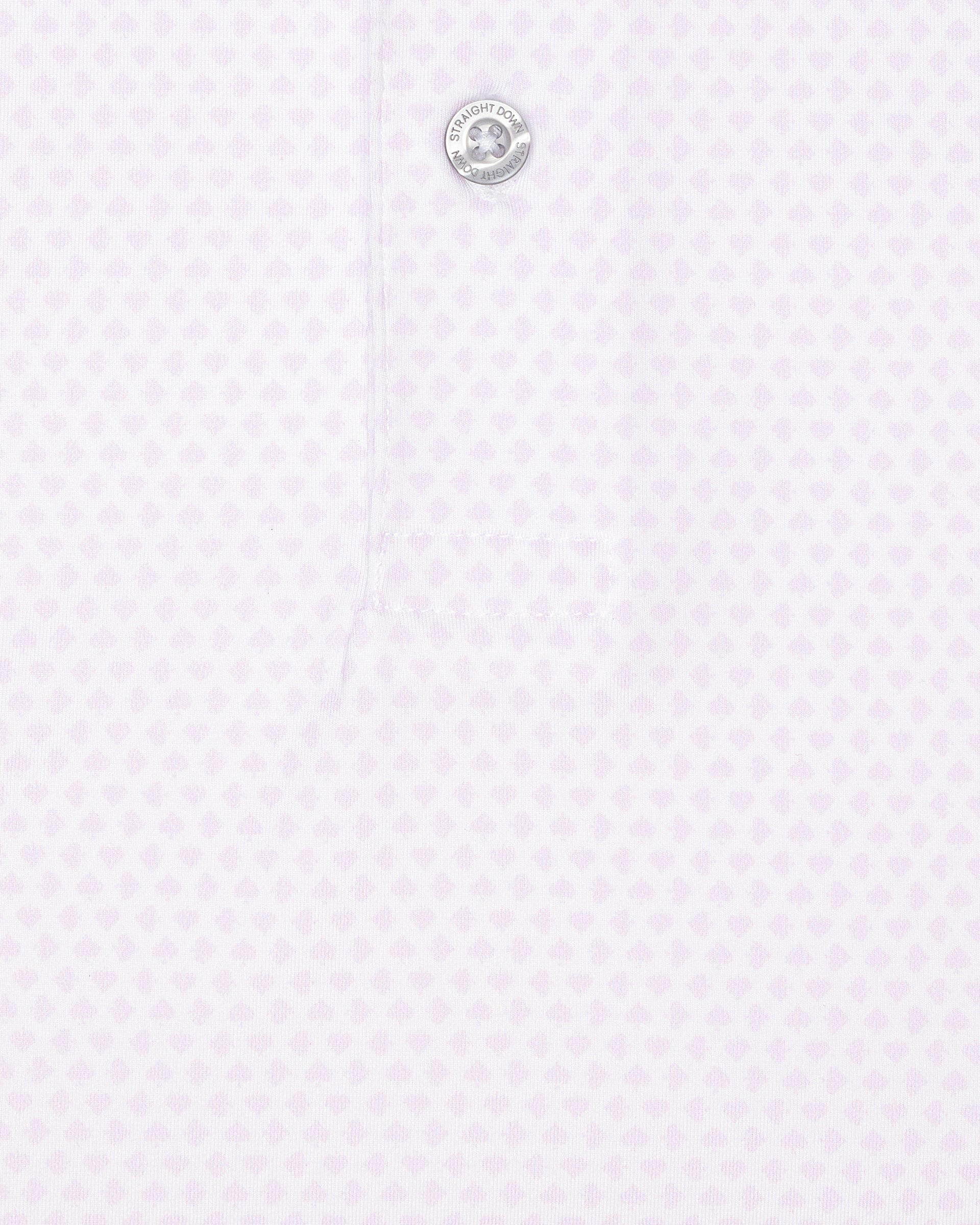 Close-up of polo fabric with subtle ace-of-spades print in lilac and button placket detail