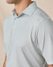 Close-up of the Campus Stripe Polo in Herb highlighting the fine white stripes, collar, and button placket.