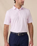 Model wearing the Campus Stripe Polo in lilac with navy pants, showcasing the classic striped design