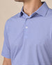 Close-up of the Campus Stripe Polo in Tidal Blue highlighting the self-collar, three-button placket, and blue and white stripe pattern