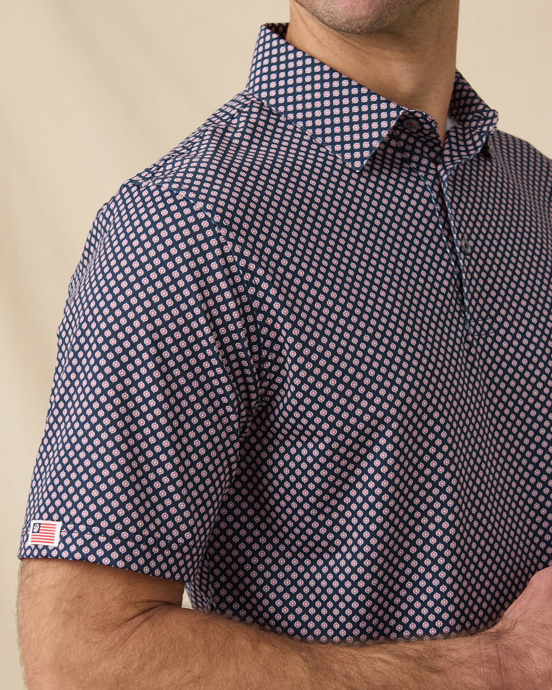 Ironwood Polo in New Indigo with sleeve logo detail close-up