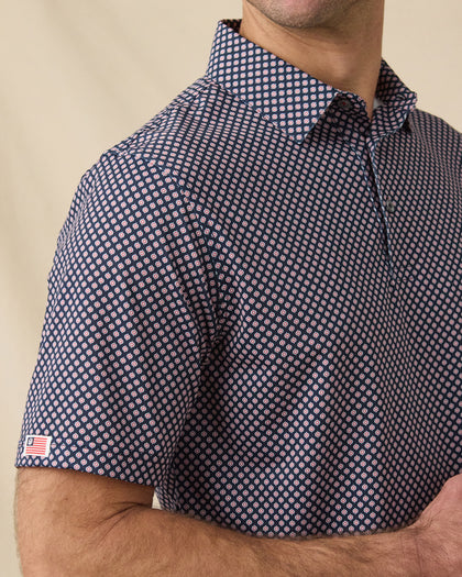 Ironwood Polo in New Indigo with sleeve logo detail close-up