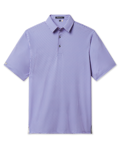 Ironwood Polo in tidal blue with an all-over pink geometric pattern, short sleeves, and a tailored golf fit