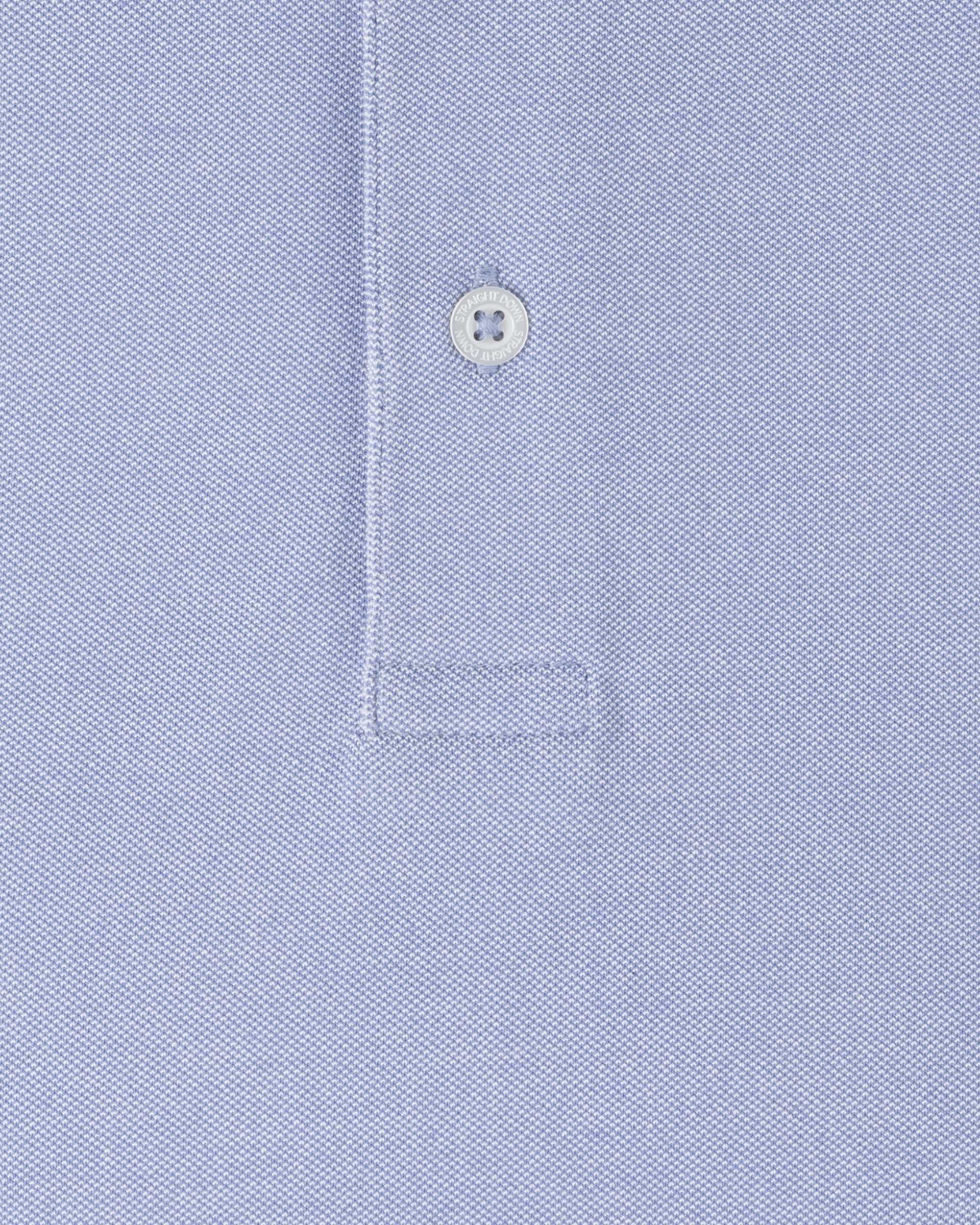 Close-up of Oxford Polo fabric in chambray blue showing textured knit construction and button placket detail