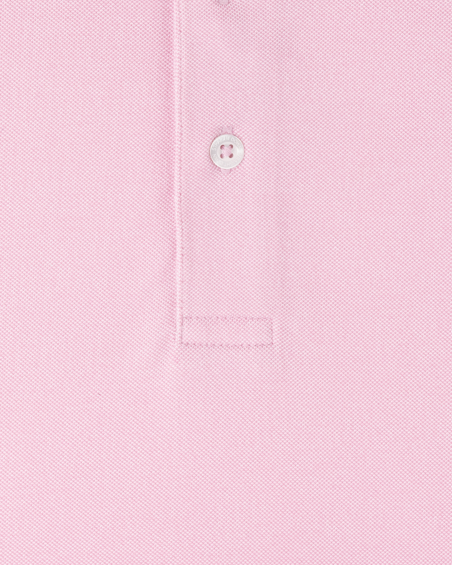 Close-up of Oxford Polo fabric in punch pink showing textured knit construction and button placket detail