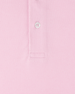 Close-up of Oxford Polo fabric in punch pink showing textured knit construction and button placket detail