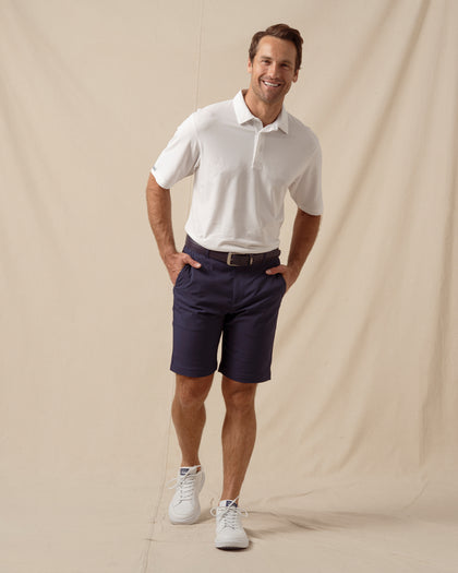 Oxford Polo in White, full outfit model view styled with navy shorts