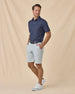 Star Struck Polo in New Indigo, full outfit styled with light gray shorts and white sneakers