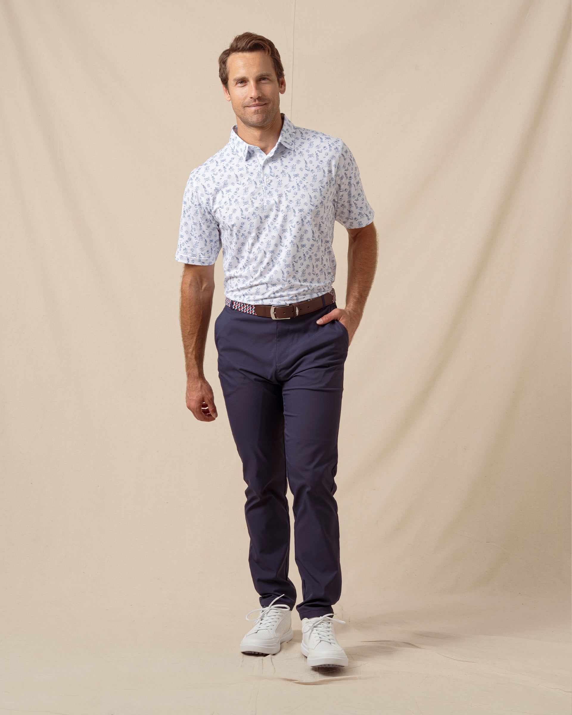 Independence Day Polo in New Indigo styled with navy golf pants, full outfit view
