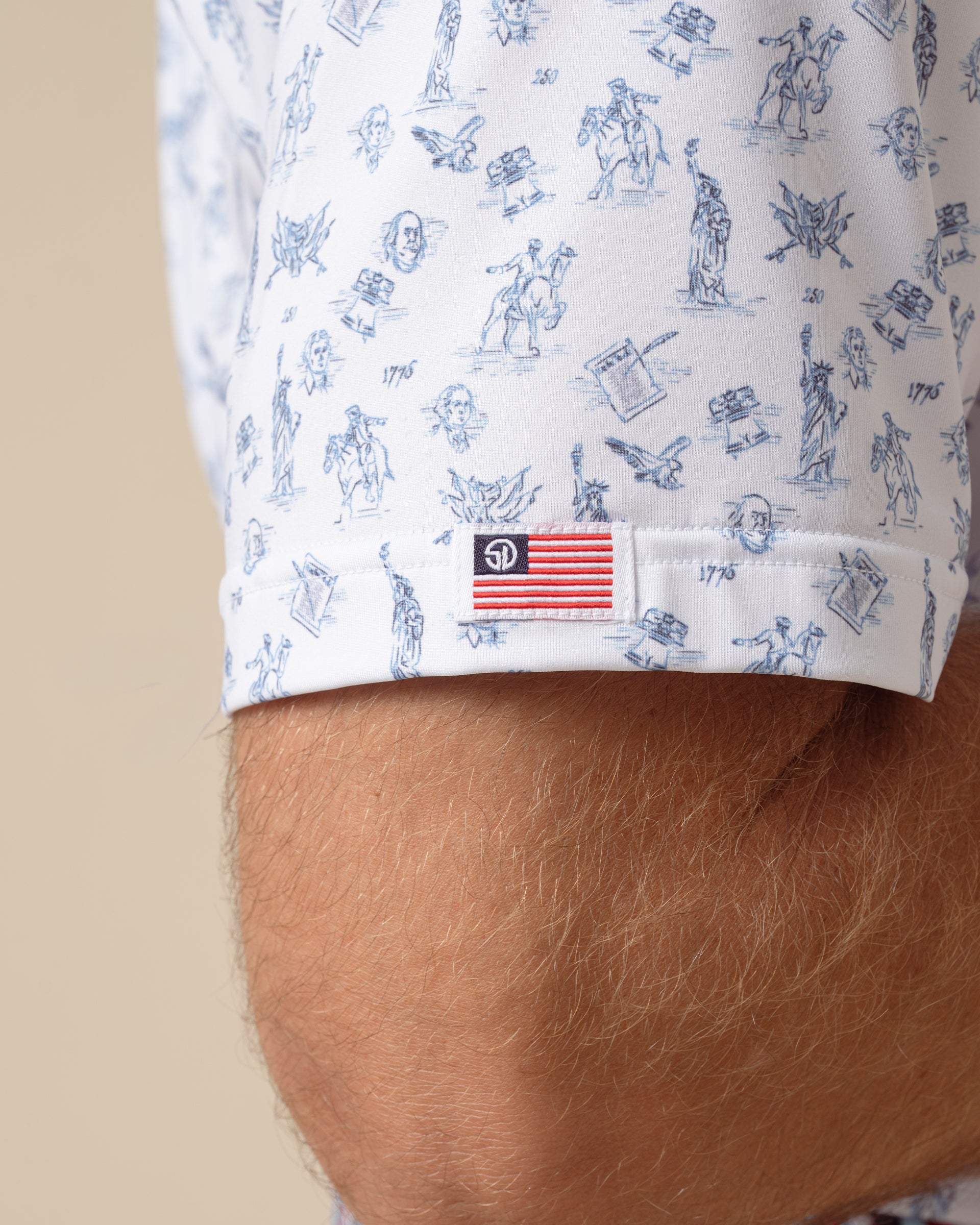 Independence Day Polo in New Indigo with American flag sleeve tag detail