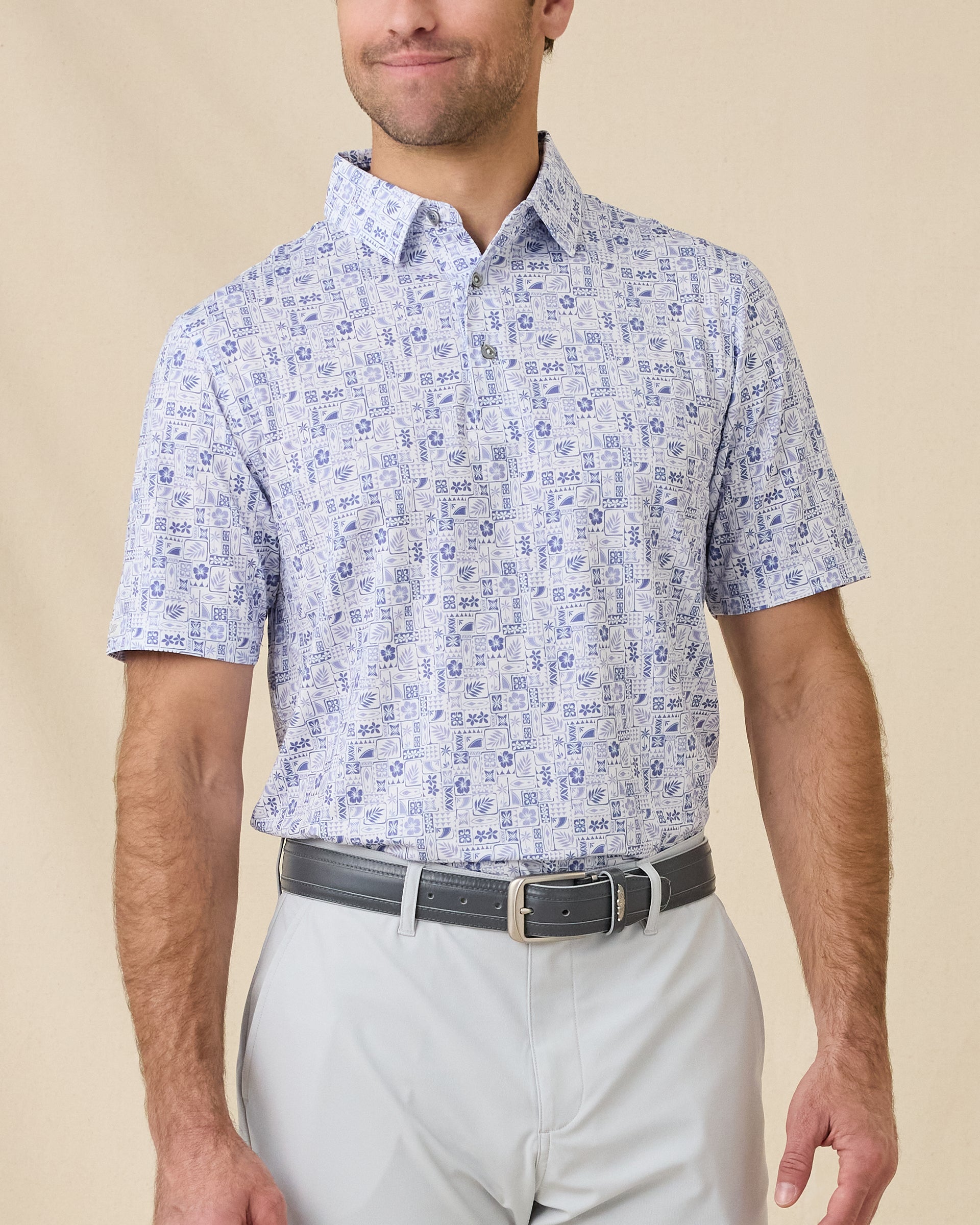 Waterman Polo in Tidal Blue featuring an allover island-inspired tile print, front model view