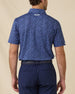 Back view of the Tropics Lounge Polo in Tidal Blue featuring a full-coverage tropical print