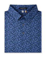 Tropics Lounge Polo in Tidal Blue with an allover tropical print, folded view