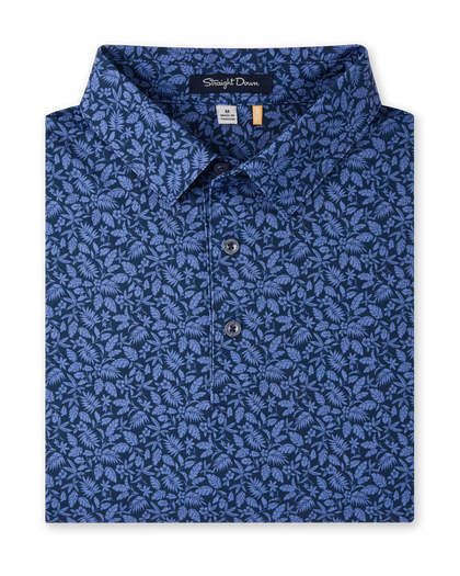 Tropics Lounge Polo in Tidal Blue with an allover tropical print, folded view