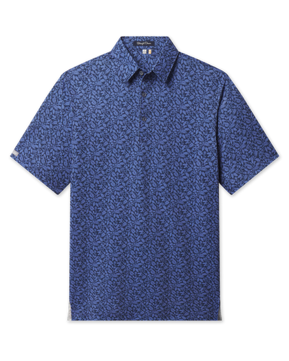 Men's Tropics Lounge Polo in Tidal Blue featuring an allover tropical pattern, front flat lay view