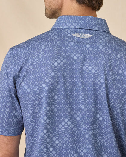Close-up of the Sarasota Polo in Moonlight showing the all-over print and embroidered logo below the collar.