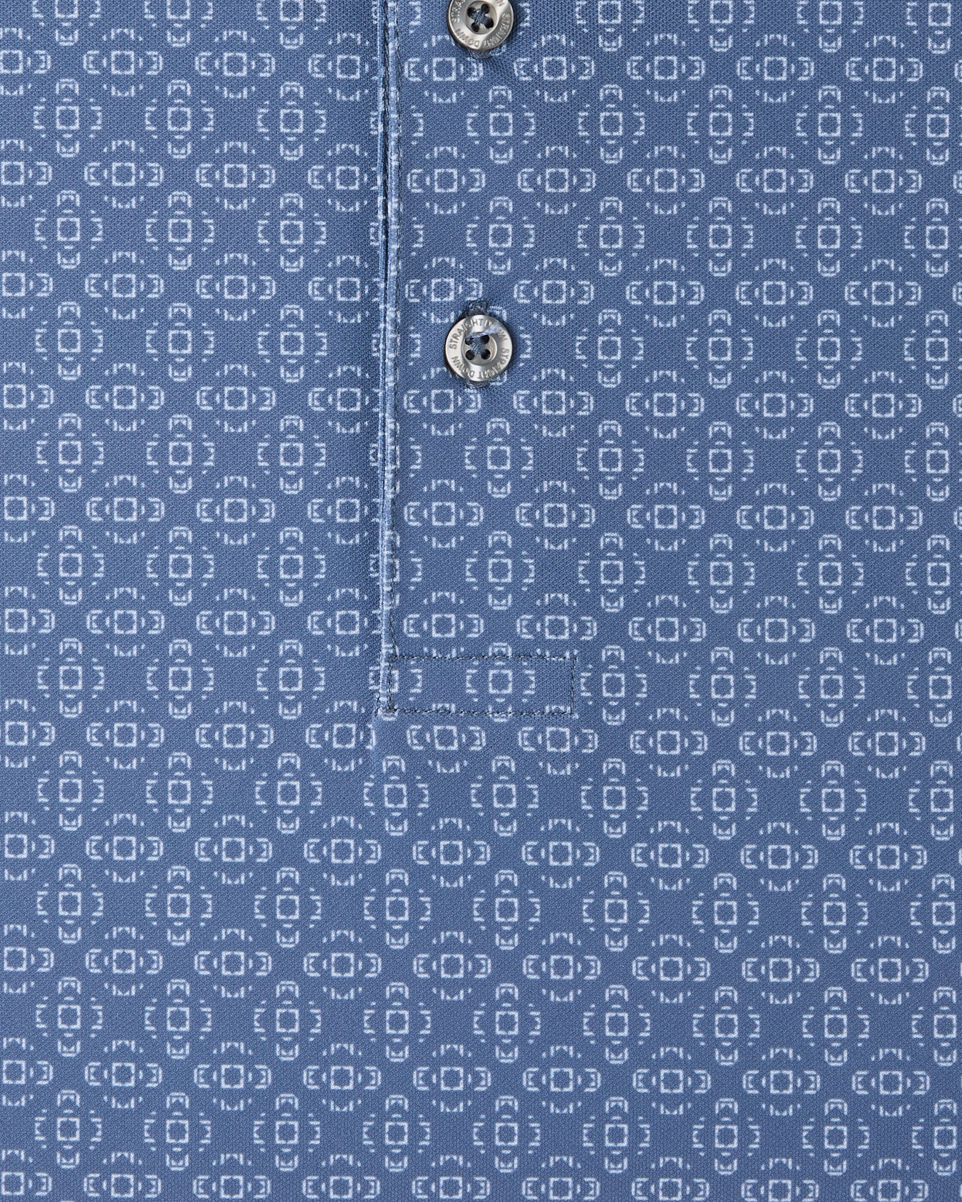 Close-up of the Sarasota Polo in Moonlight highlighting the geometric pattern, buttons, and placket stitching.