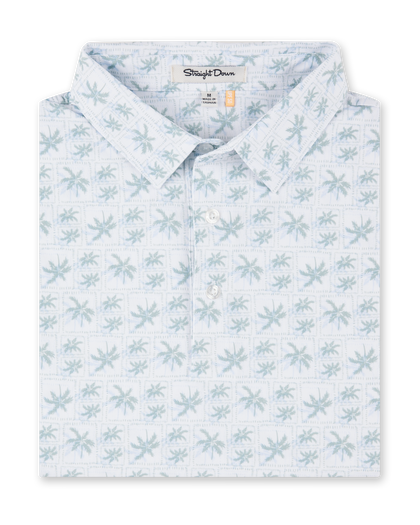 Folded 29 Palms Polo in Herb featuring an allover light green palm tree print on a white background.
