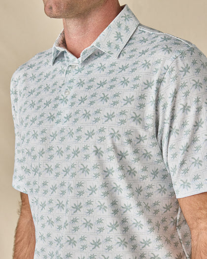 Close-up of the 29 Palms Polo in Herb, highlighting the tonal palm tree print and classic polo collar.