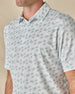 Close-up of the 29 Palms Polo in Herb, highlighting the tonal palm tree print and classic polo collar.