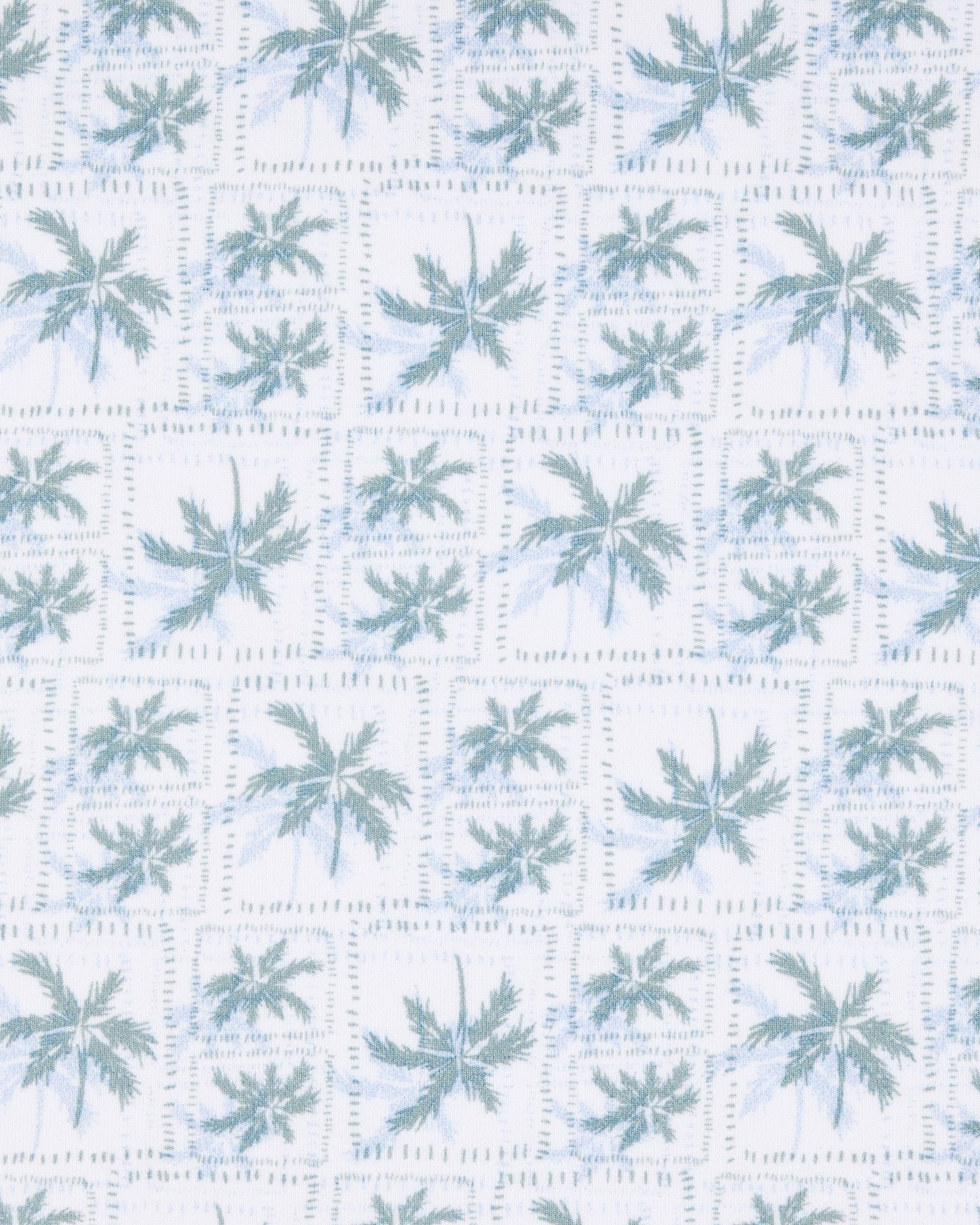 Close-up of the 29 Palms Polo in Herb showing the repeating light green palm tree print arranged in a subtle grid pattern.