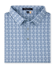Grayhawk Polo in Moonlight featuring an intricate blue and light green geometric print with a classic polo collar and button placket.