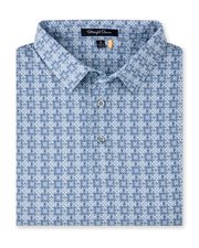 Grayhawk Polo in Moonlight featuring an intricate blue and light green geometric print with a classic polo collar and button placket.