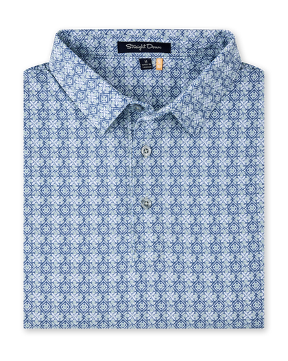 Grayhawk Polo in Moonlight featuring an intricate blue and light green geometric print with a classic polo collar and button placket.