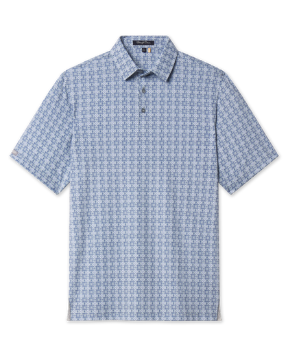 Grayhawk Polo in Moonlight featuring an all-over blue and light green geometric pattern, short sleeves, and three-button placket.