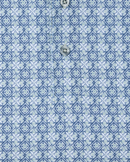 Close-up of the Grayhawk Polo in Moonlight highlighting the detailed geometric pattern and button placket.