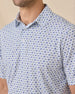 Close-up of the Day of the Dead Polo highlighting the blue and green sugar skull print, collar, and button placket.