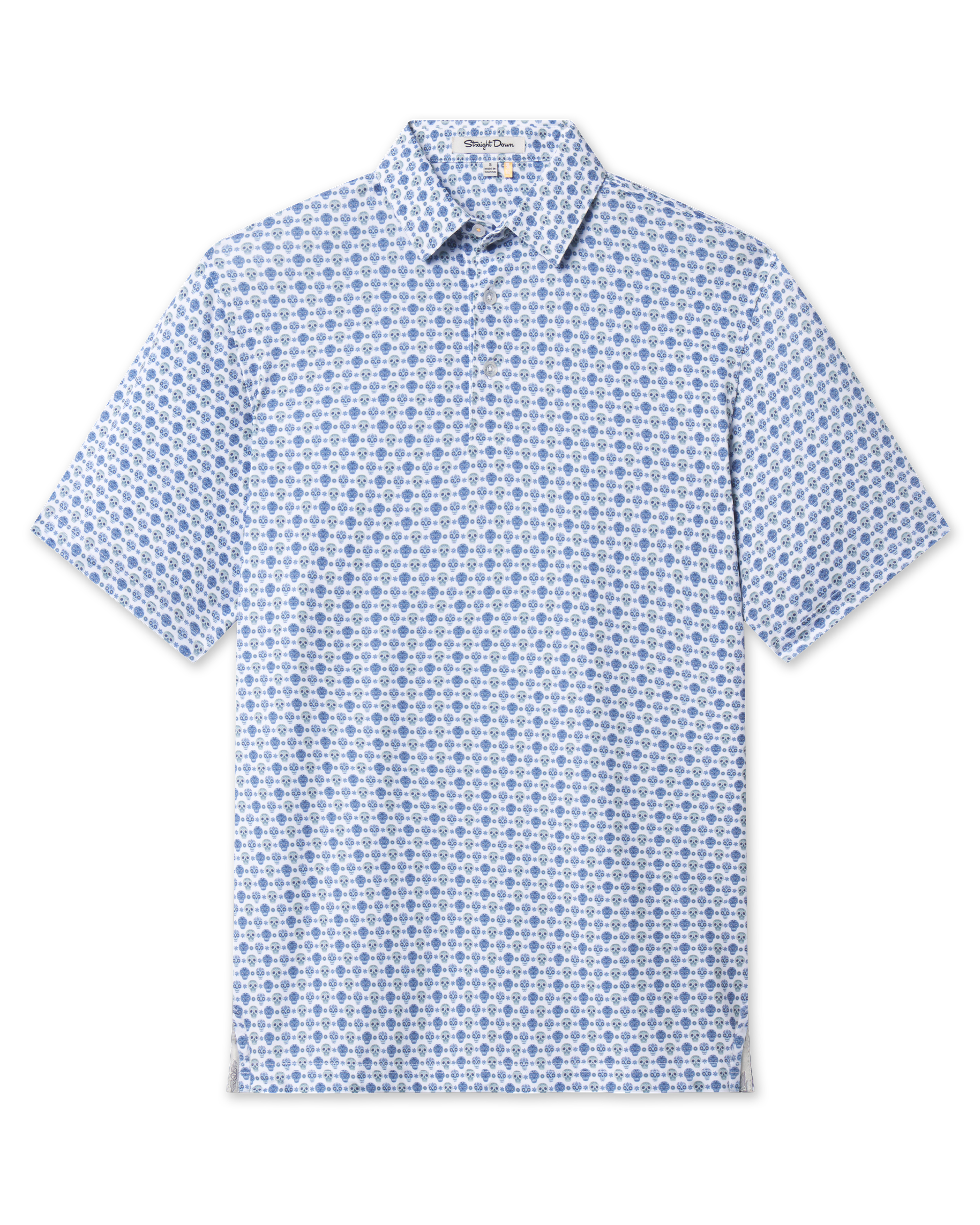 Day of the Dead Polo in Herb featuring short sleeves, a classic collar, and an all-over blue and green sugar skull print.