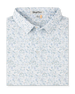 Route 66 Polo in Herb featuring an all-over illustrated print inspired by classic roadside landmarks, cars, palm trees, and desert scenery.