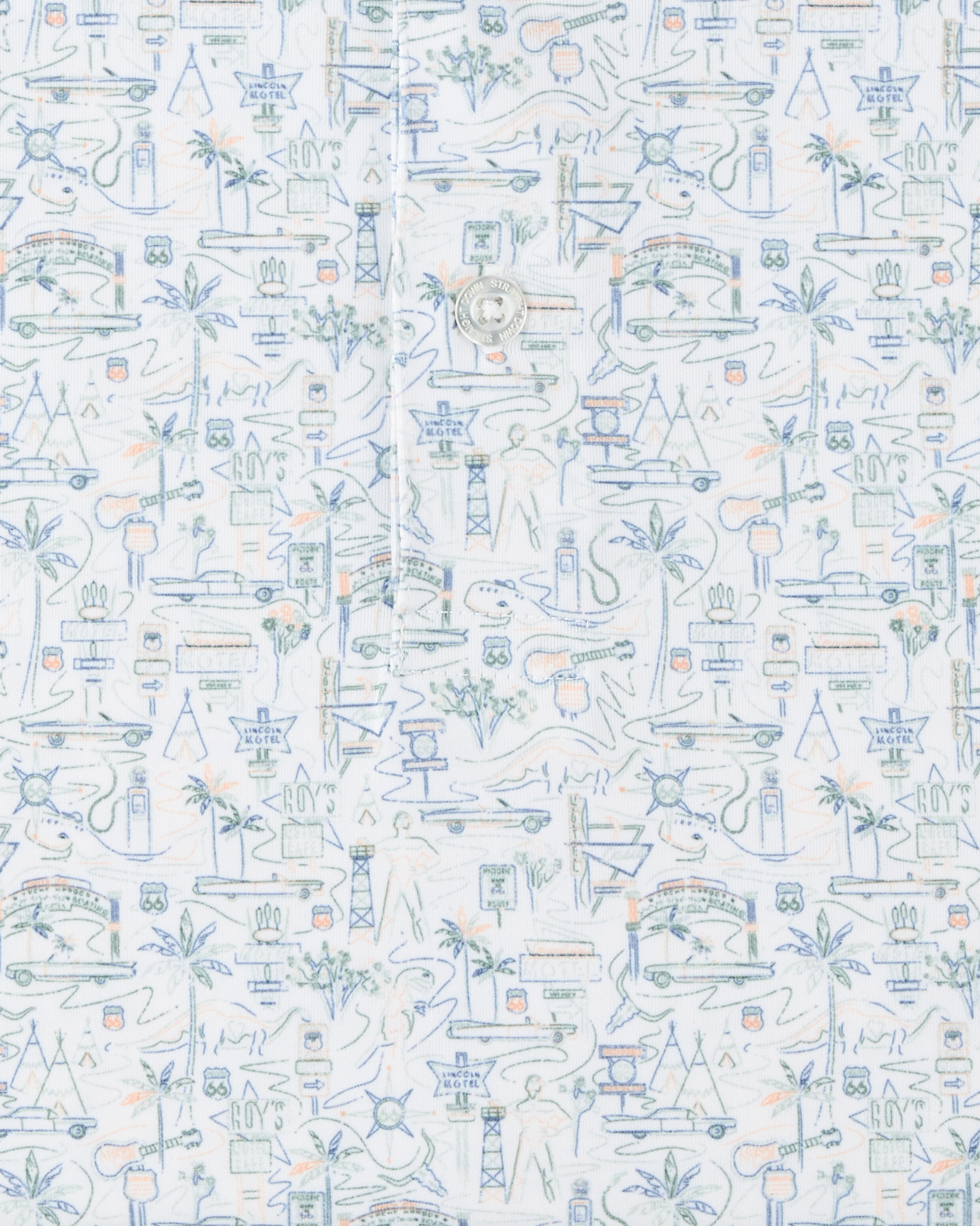 Close-up of the Route 66 Polo fabric highlighting the detailed roadside-inspired print with cars, signs, palm trees, guitars, and desert motifs.