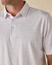 Close-up of the Pink Flamingo Polo in Sea Shell, highlighting the miniature flamingo print, classic collar, and button placket.