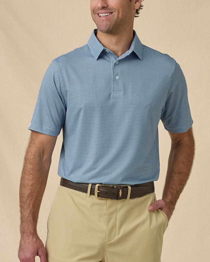 F-16 Polo in Nantucket Blue, front model view with khaki shorts
