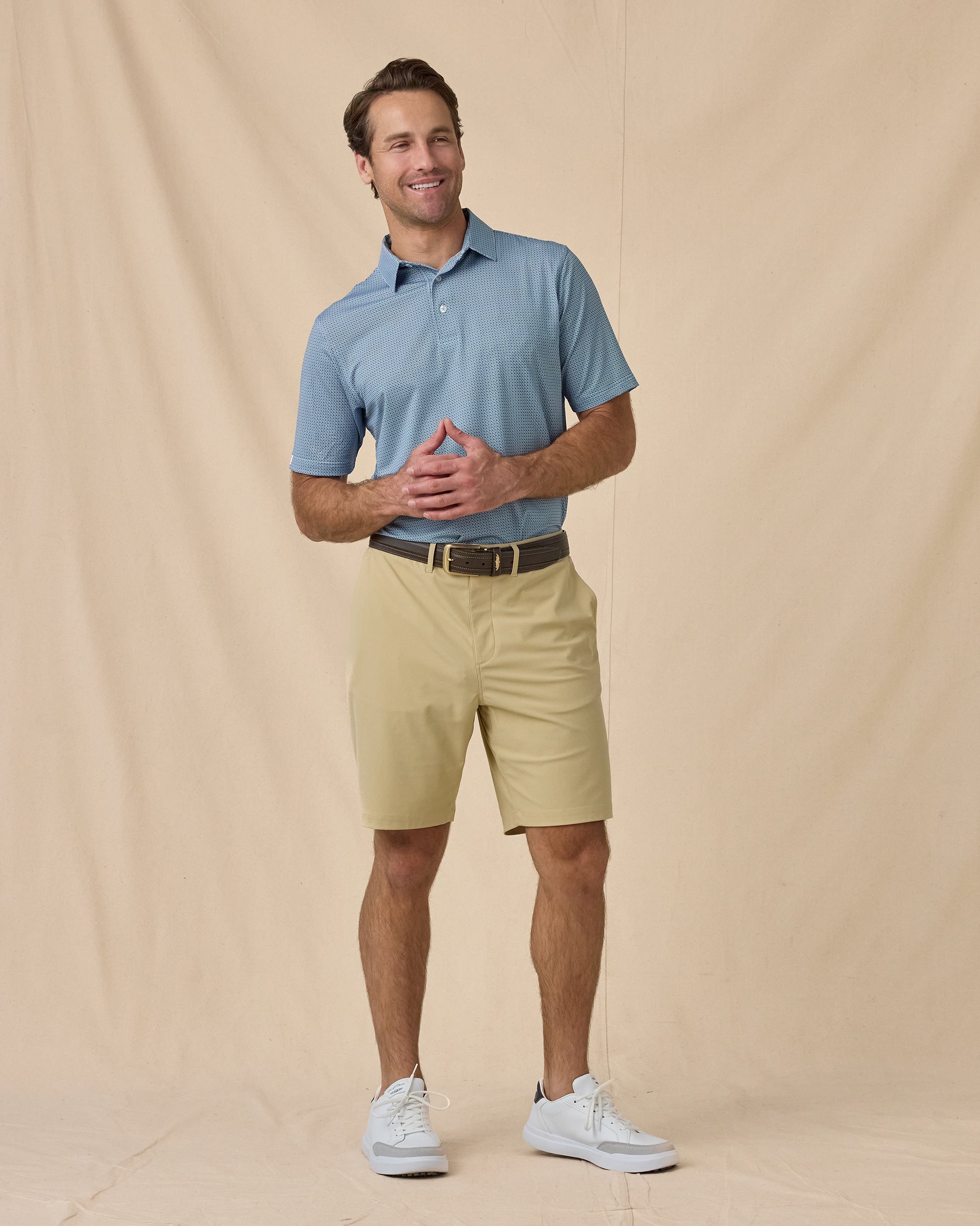 F-16 Polo in Nantucket Blue, full outfit styled with khaki shorts and white sneakers