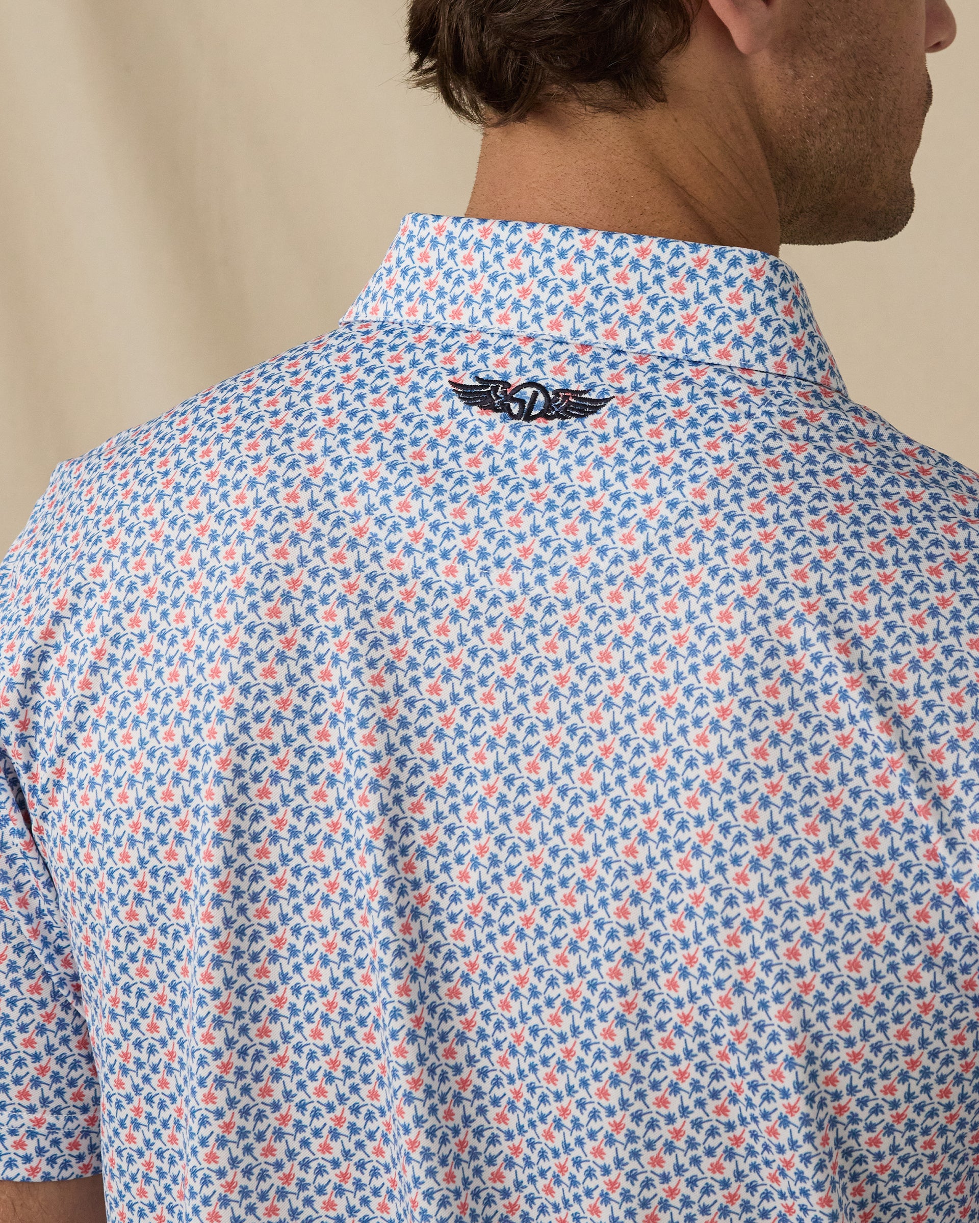 Kona Palms Polo in Cobalt blue, back logo detail close-up