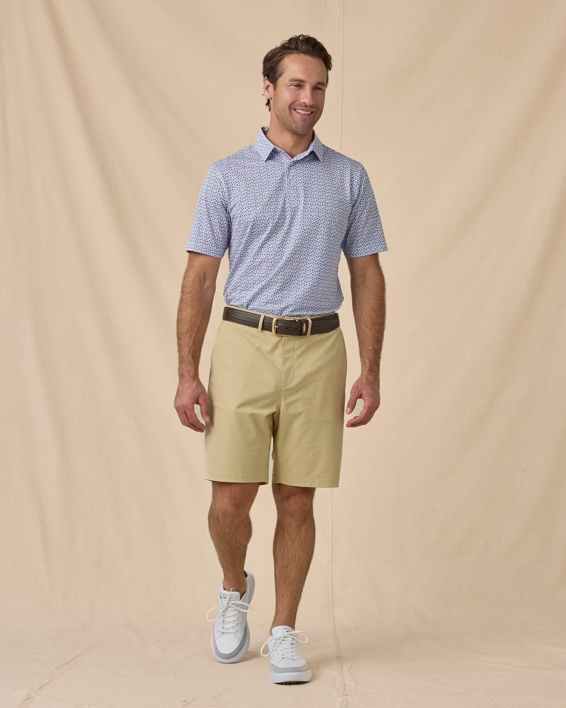 Men’s Kona Palms Polo in Cobalt blue, styled full outfit view with light shorts