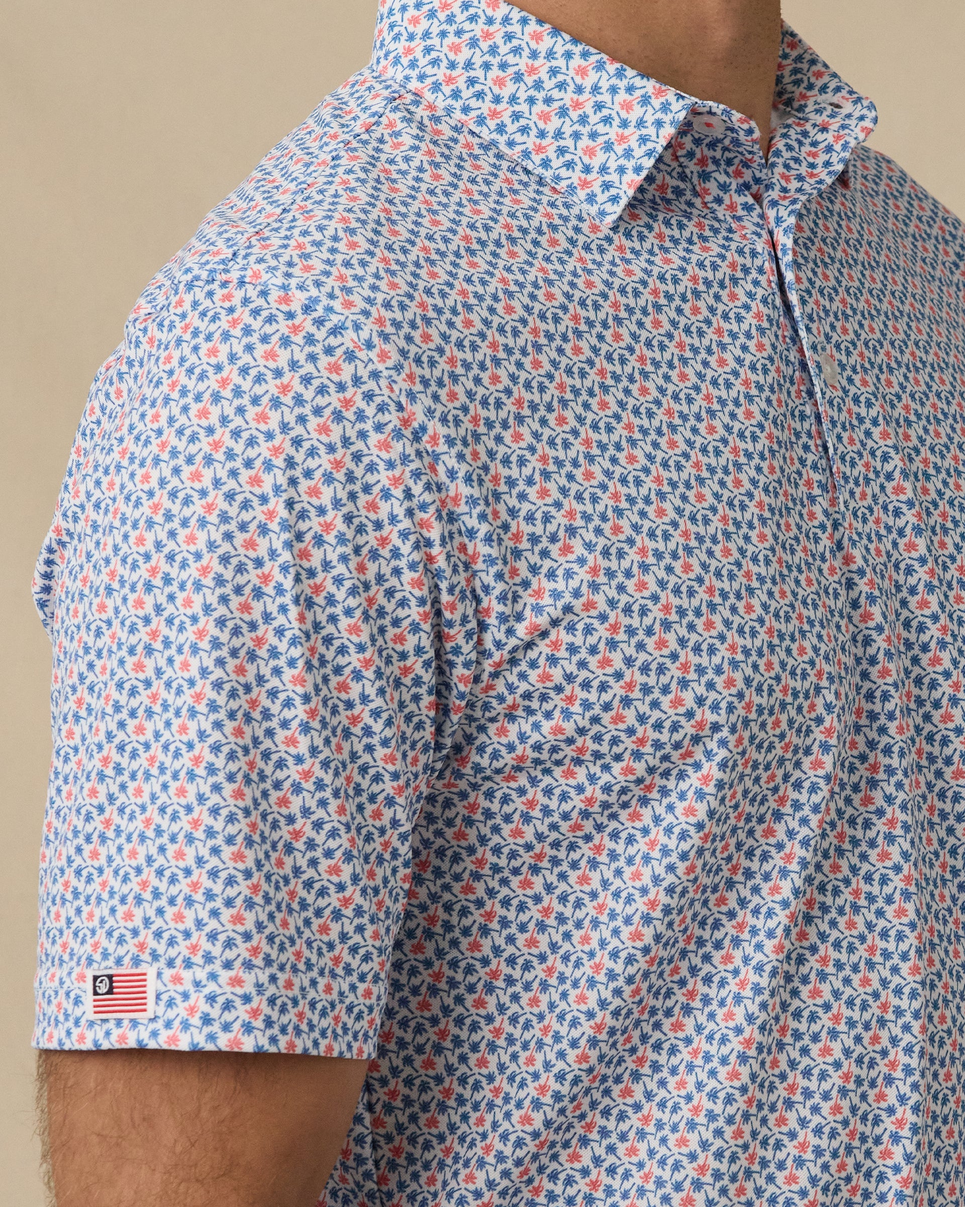 Kona Palms Polo in Cobalt blue with sleeve detail close-up