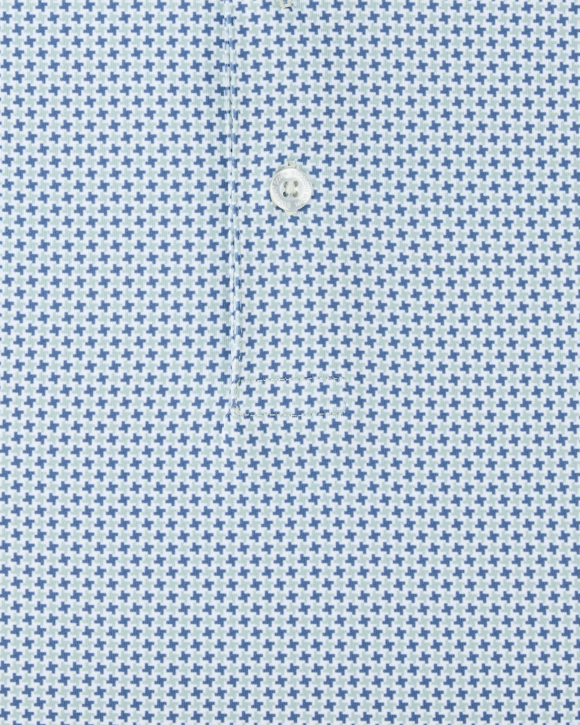 Close-up of a light blue and white micro-patterned fabric with a single white button at the center.