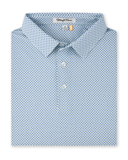 A folded light blue dress shirt with a small repeating blue and green geometric pattern, featuring a pointed collar, two-button placket, and a visible Straight Down neck label.