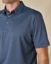 Close-up of the Banksville Polo in New Indigo highlighting the collar, buttons, and geometric print.