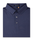 Folded Banksville Polo in Tidal Blue displaying the geometric pattern, collar, and button placket