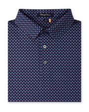 Folded Banksville Polo in Tidal Blue displaying the geometric pattern, collar, and button placket