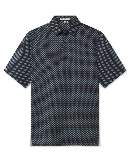 Front view of the Banksville Polo in Black with an all-over light blue geometric print, short sleeves, and button placket.
