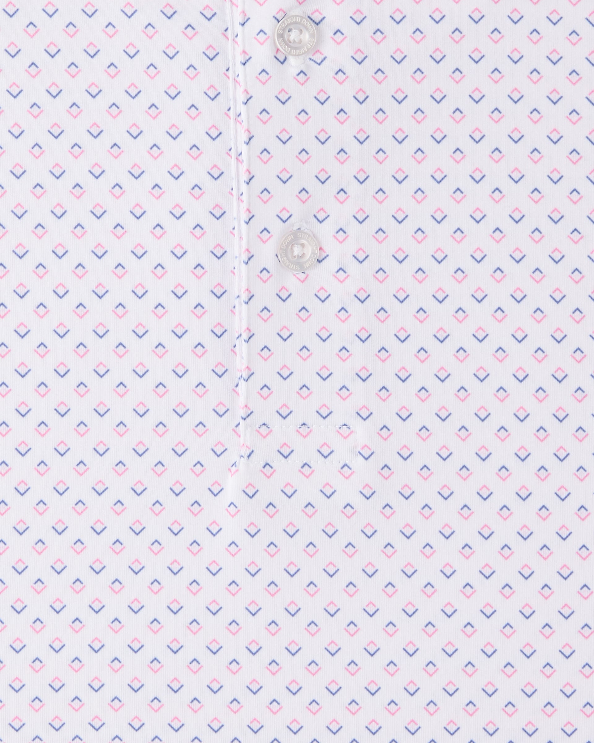 Detailed view of the Brookhurst Polo in Punch Pink geometric print with pink and blue diamond-inspired motifs