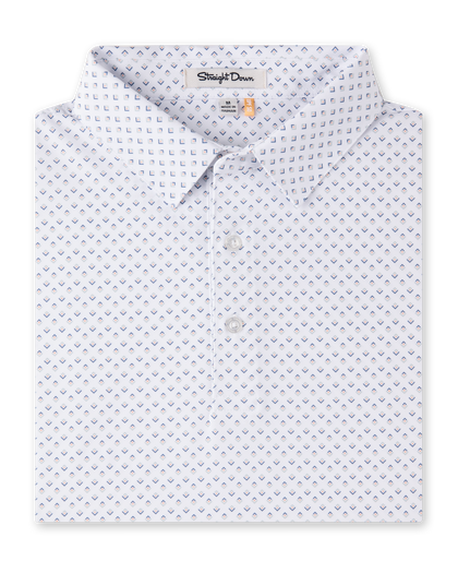 Folded Brookhurst Polo in Herb featuring an all-over blue and coral geometric print, self collar, and button placket.