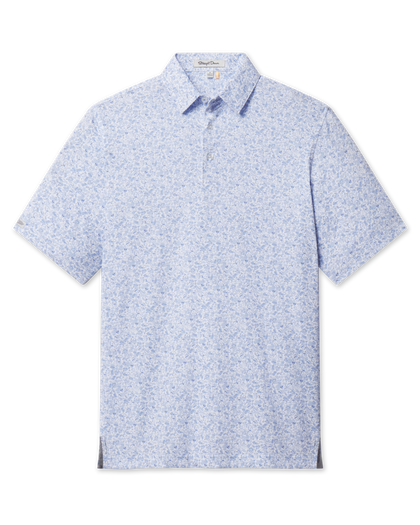 Poker Dawgs Polo in Tidal Blue with an allover poker-themed print, front flat lay view