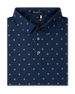 Close-up product view of the Al Fresco Polo in New Indigo, featuring an allover blue and pink floral motif, classic collar, and button placket.